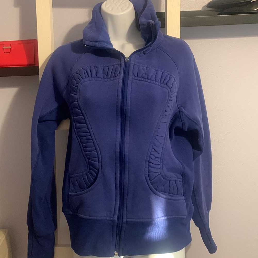 Lululemon cuddle up jacket size 10.  Flawed:  no zipper pull.  Zipper works.